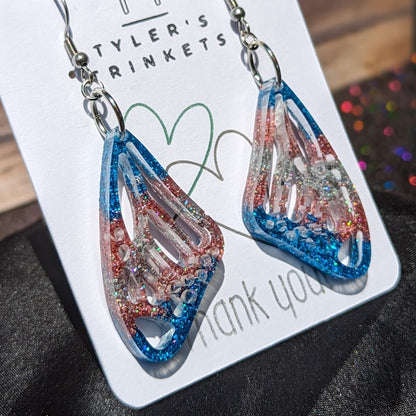 Fluttering Radiance - Trans Pride Butterfly Wing Earrings